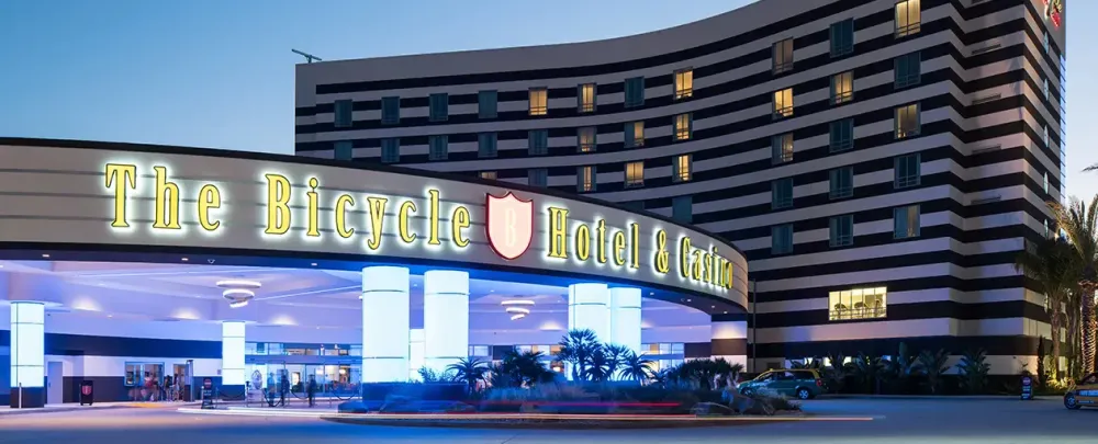 The Bicycle Hotel and Casino architecture business travel building illuminated hotel outdoors casino finance road street city sky commerce dusk modern evening stock shopping