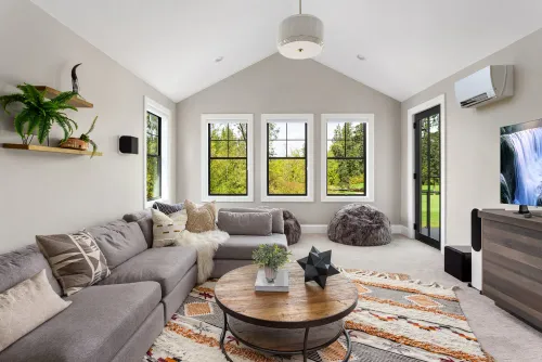 What Is a Mini-Split? room indoors family sofa contemporary house home window apartment seat coffee table minimalist luxury fireplace cushion